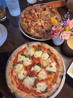 Root & Vine Restaurant - Farm to Table with wood fired grill & pizza oven.