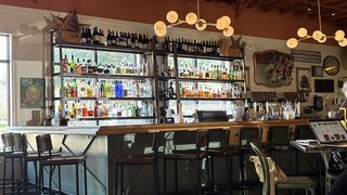 Root & Vine Restaurant - Farm to Table with wood fired grill & pizza oven.